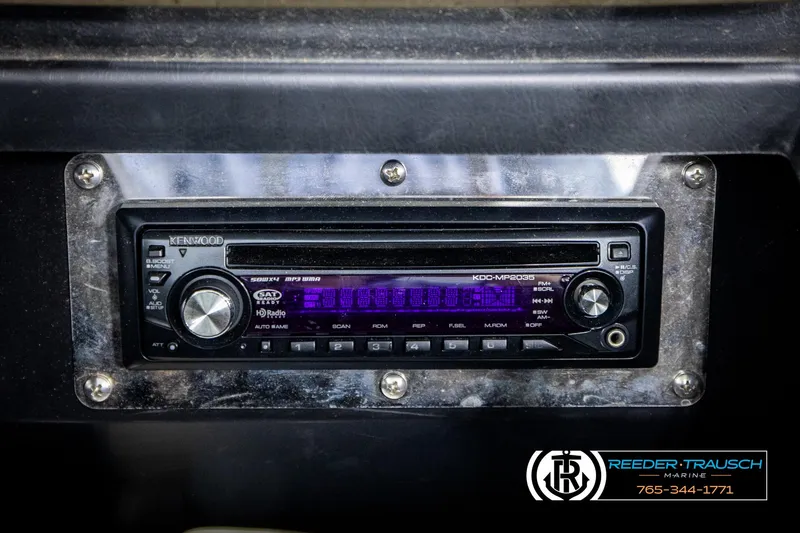 Slide: The Image of 2008 Regal 1900 stereo system with Kenwood CD receiver and purple display. - 32