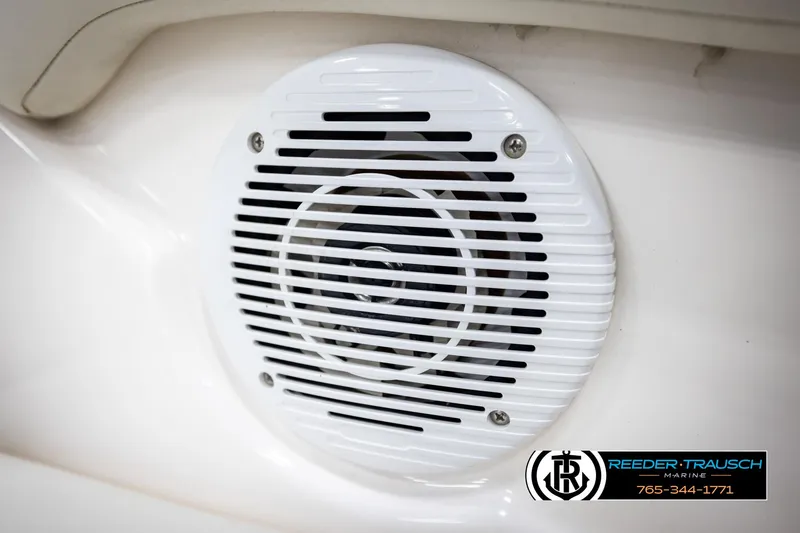 Slide: The Image of White speaker on a 2008 Regal 1900 boat interior. - 33