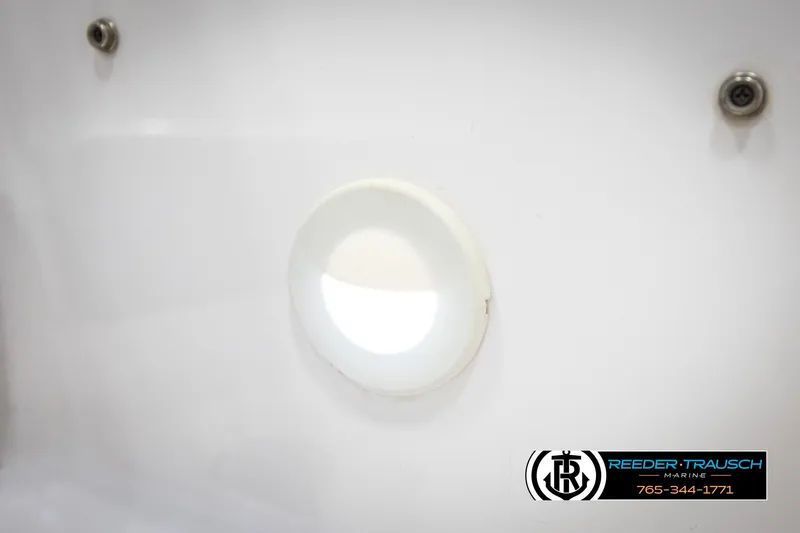 Slide: The Image of Circular window on a 2008 Regal 1900 boat interior. - 35