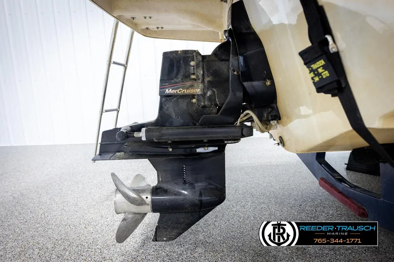 Slide: The Image of 2008 Regal 1900 boat with MerCruiser outboard motor and propeller, side view. - 41