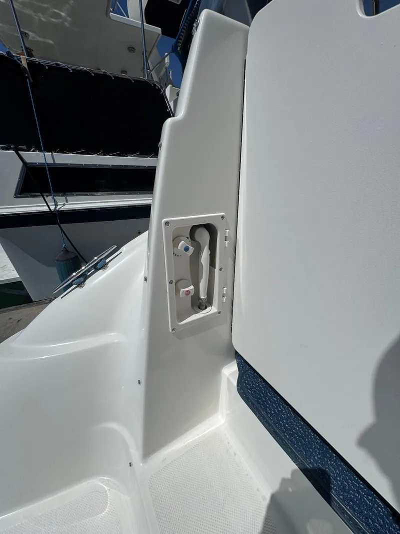 Slide: The Image of 2006 Bayliner 325 boat interior detail with control panel. - 7