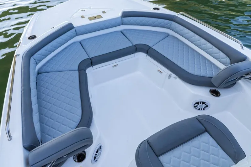Slide: The Image of 2020 NauticStar 211 Hybrid boat on lift at marina dock. - 6