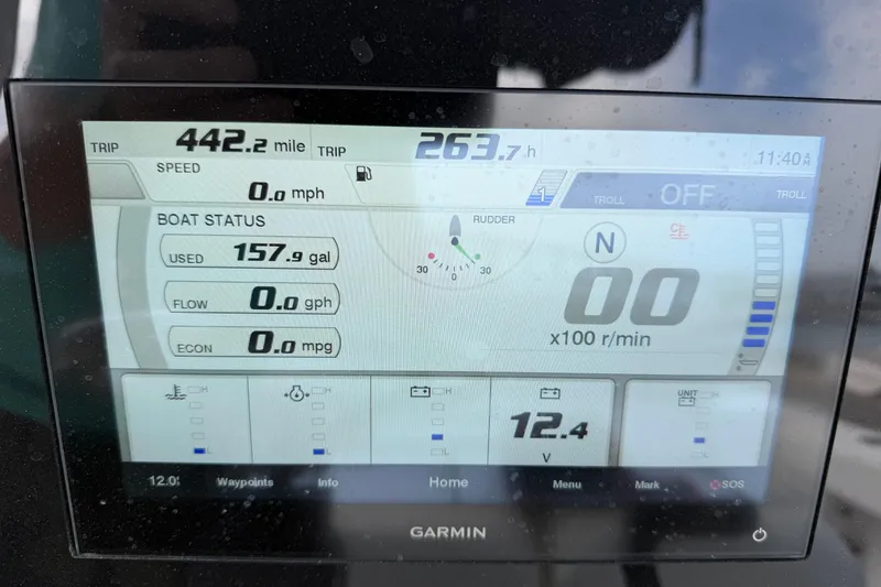 Slide: The Image of Garmin display on 2022 Sportsman Open 232 Center Console showing trip and boat status. - 5