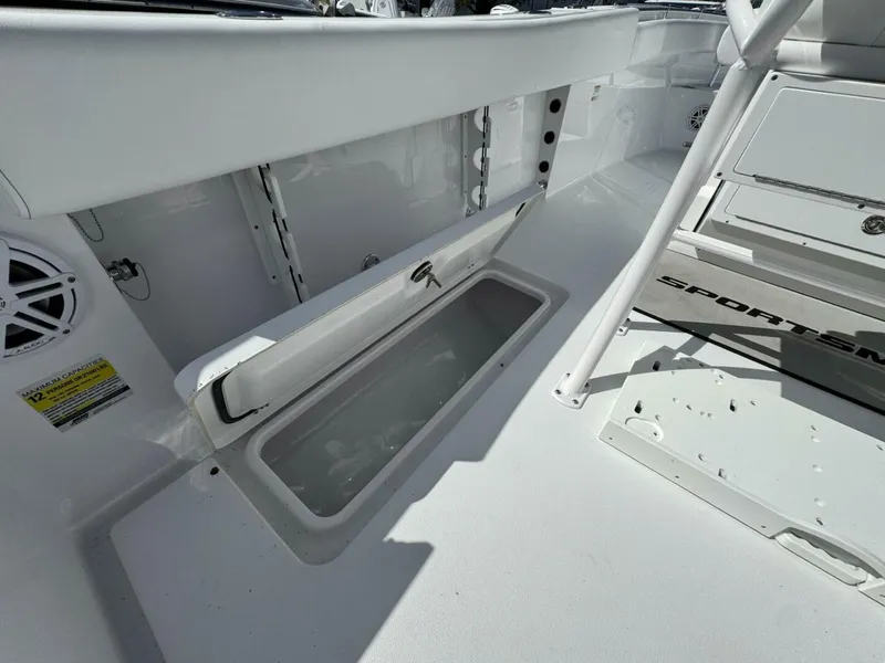 Slide: The Image of 2025 Sportsman 252 Open boat interior with storage compartment and speaker. - 6