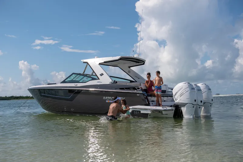 The Image of 2026 Monterey 385SS boat with people enjoying a sunny day on the water. - 0