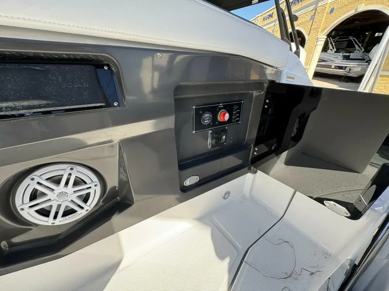 Slide: The Image of 2024 Monterey 255SS boat interior with speaker and control panel. - 11