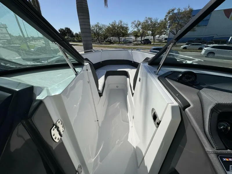 Slide: The Image of 2024 Monterey 255SS boat interior with sleek design and modern dashboard. - 21