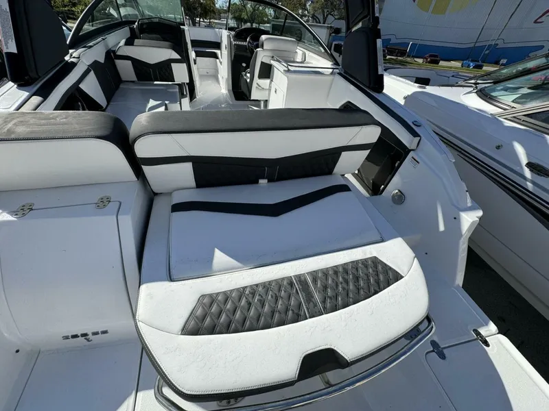Slide: The Image of 2024 Monterey 255SS boat interior with luxurious seating and modern design. - 6