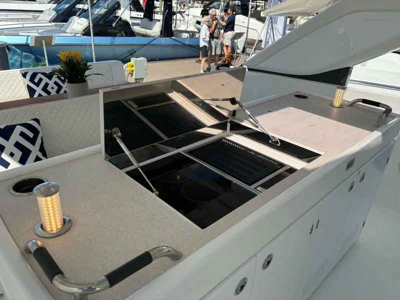 Slide: The Image of Outdoor kitchen on 2024 Jeanneau DB43 yacht with grill and modern design. - 10
