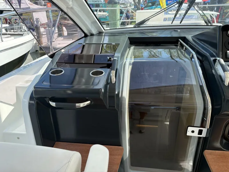 Slide: The Image of 2024 Jeanneau DB43 yacht cockpit with sleek design and modern amenities. - 17
