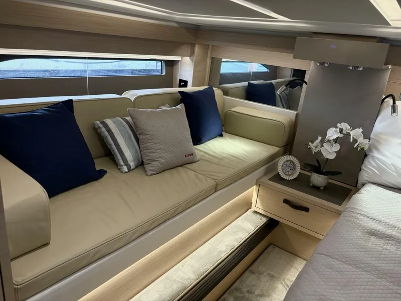 Slide: The Image of Luxurious interior of 2024 Jeanneau DB43 yacht with elegant seating and decor. - 24