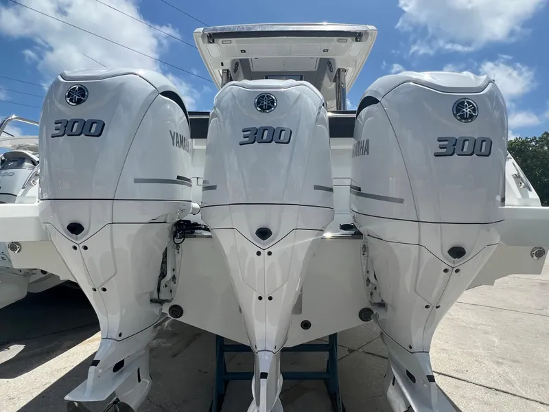 Slide: The Image of 2024 Jeanneau 12.5 Walk boat interior with sleek kitchen and modern amenities. - 4