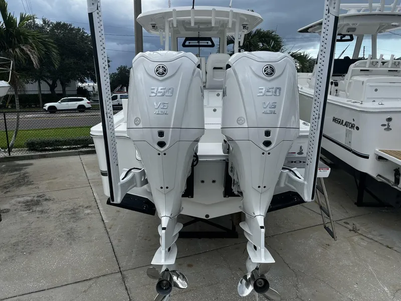 Slide: The Image of 2025 Regulator 30XO boat with twin Yamaha 350 V6 outboard engines. - 4