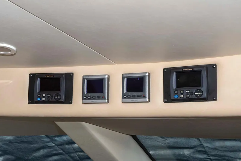 Slide: The Image of Control panel of 2002 Hatteras 63 Raised Pilothouse Motor Yacht. - 35