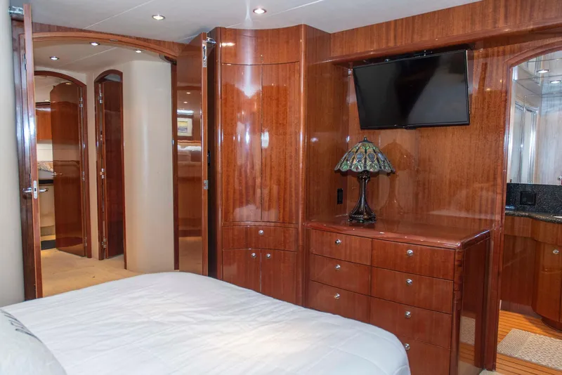 Slide: The Image of Luxurious bedroom interior of 2002 Hatteras 63 Raised Pilothouse Motor Yacht with wood finish. - 42