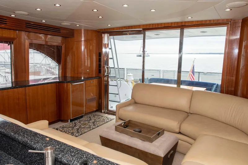 Slide: The Image of Luxurious interior of 2002 Hatteras 63 Raised Pilothouse Motor Yacht with leather seating and ocean view. - 7