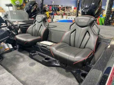 Slide: The Image of 2025 Skeeter ZXR 21 boat interior with black leather seats and modern design. - 3