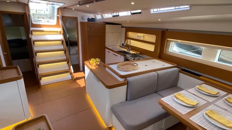Slide: The Image of Luxurious interior of 2020 Beneteau First 53 yacht with modern kitchen and dining area. - 27