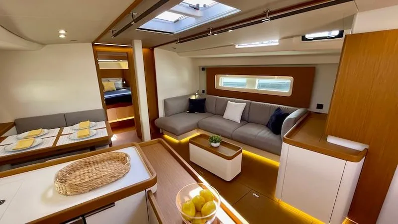 Slide: The Image of Luxurious interior of 2020 Beneteau First 53 yacht with modern furnishings and ambient lighting. - 28