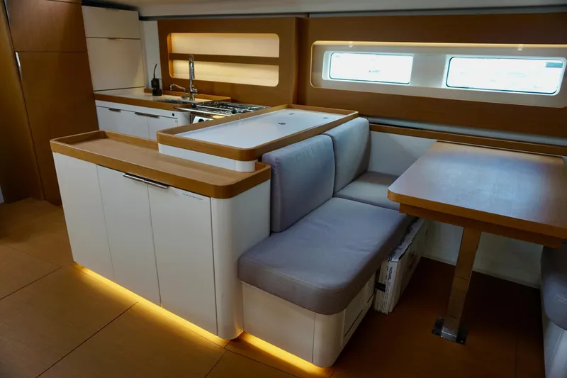 Slide: The Image of Luxurious interior of 2020 Beneteau First 53 yacht with modern kitchen and seating area. - 33