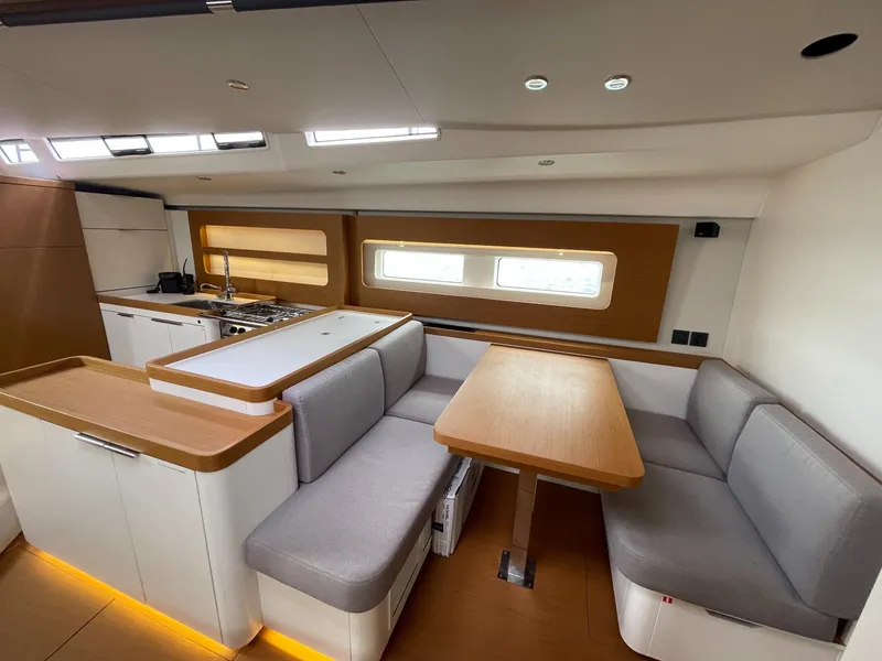 Slide: The Image of Modern interior of 2020 Beneteau First 53 yacht with sleek dining area and kitchen. - 34