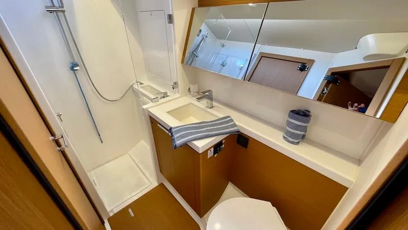 Slide: The Image of Modern bathroom in 2020 Beneteau First 53 yacht with shower and sink. - 45