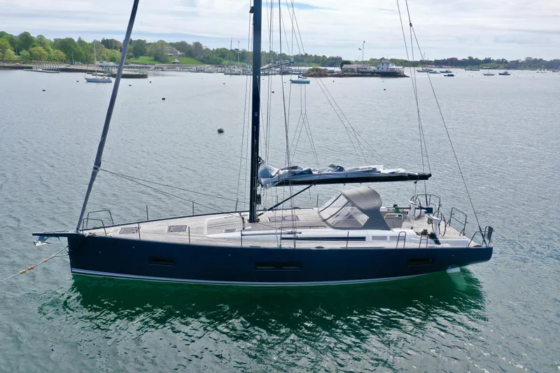 Slide: The Image of Sailing yacht Beneteau First 53, 2020 model, anchored in calm waters. - 5