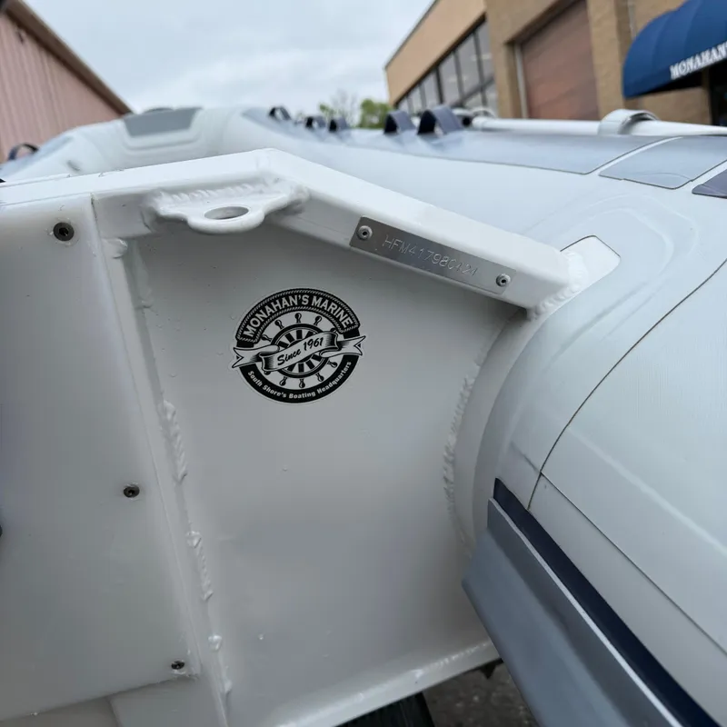 Slide: The Image of 2024 Highfield CL340 boat detail with Monahan's Marine logo. - 8
