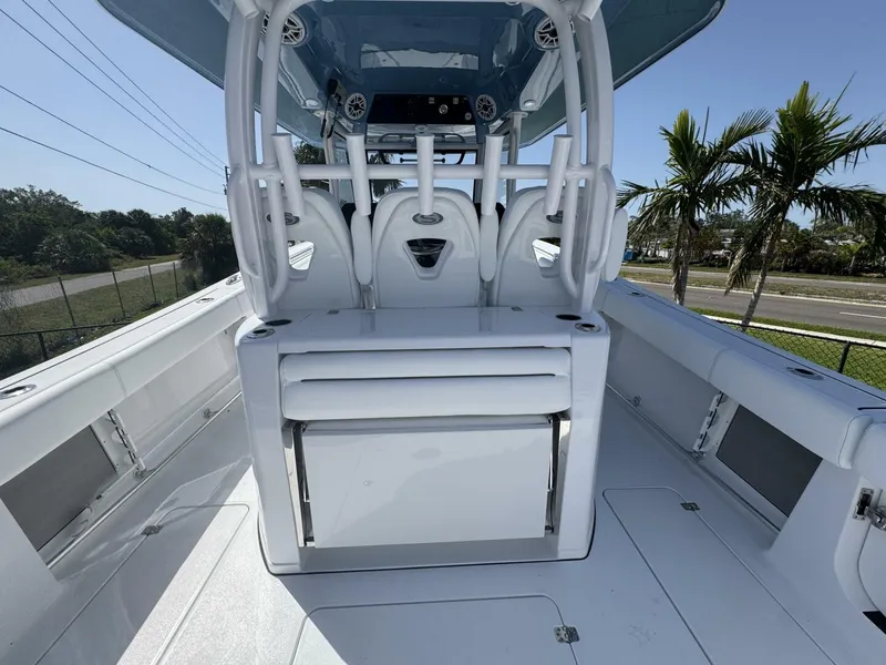 Slide: The Image of 2025 Sportsman 352 Open boat interior with seating and console, featuring sleek design and modern amenities. - 11
