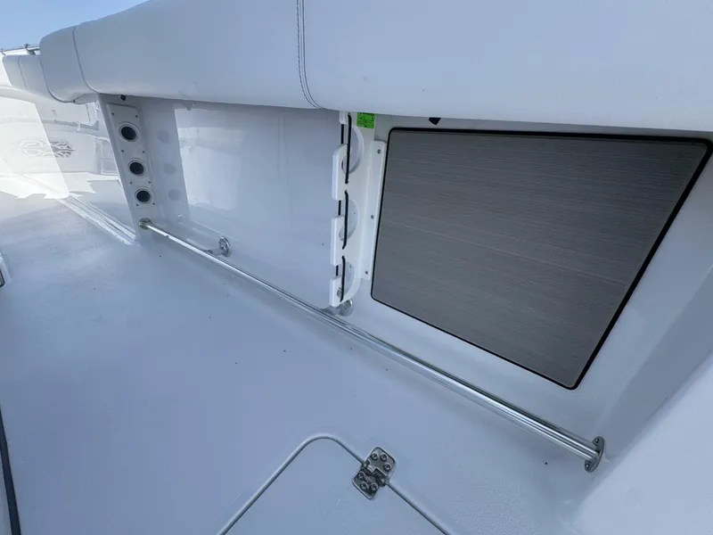 Slide: The Image of 2025 Sportsman 352 Open boat interior with sleek storage compartment and modern design. - 13