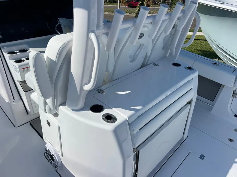 Slide: The Image of 2025 Sportsman 352 Open boat interior with rod holders and storage compartments. - 29