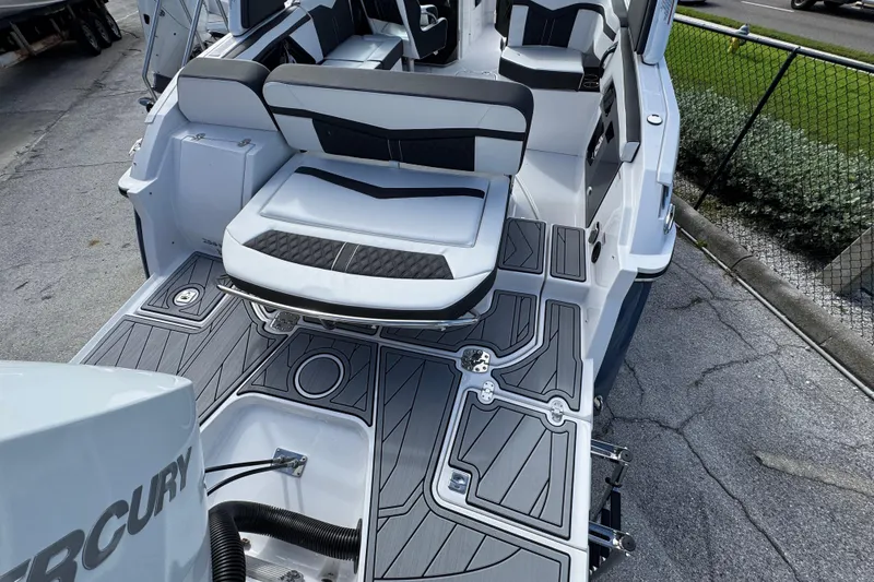 Slide: The Image of 2025 Monterey M-255 boat interior with sleek seating and modern design. - 8