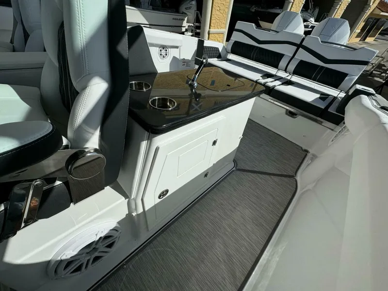 Slide: The Image of 2025 Monterey 30 ELITE boat interior with sleek seating and modern design. - 11