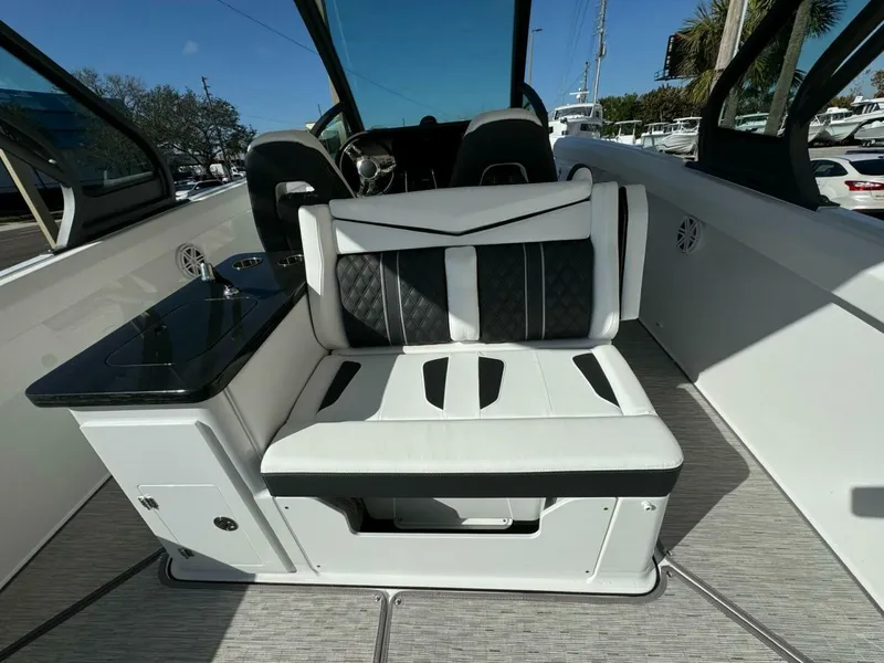 Slide: The Image of 2025 Monterey 30 ELITE boat interior with sleek seating and modern design. - 4