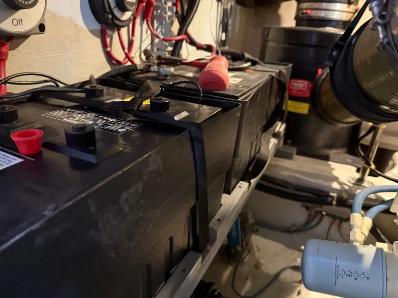 Slide: The Image of Battery compartment of a 1998 Carver 530 VOYAGER yacht, showing wiring and components. - 16
