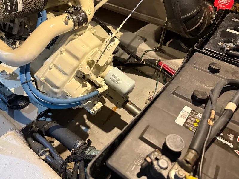Slide: The Image of Engine compartment of a 1998 Carver 530 VOYAGER with visible components and wiring. - 19