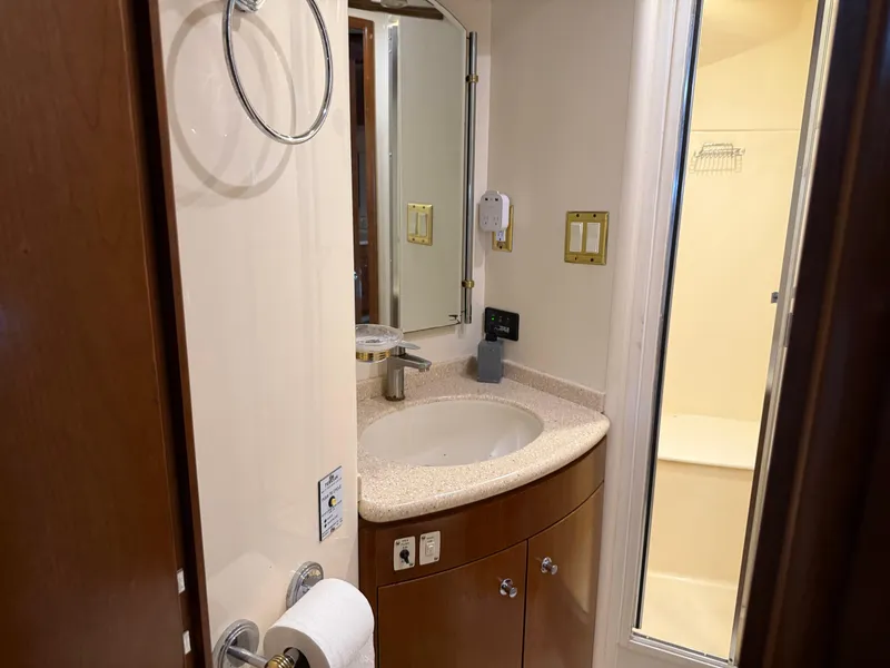 Slide: The Image of Bathroom interior of 1998 Carver 530 VOYAGER yacht with sink and shower. - 33