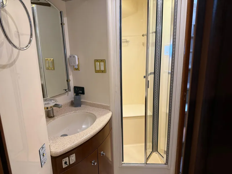 Slide: The Image of Bathroom interior of 1998 Carver 530 Voyager yacht with shower and sink. - 34