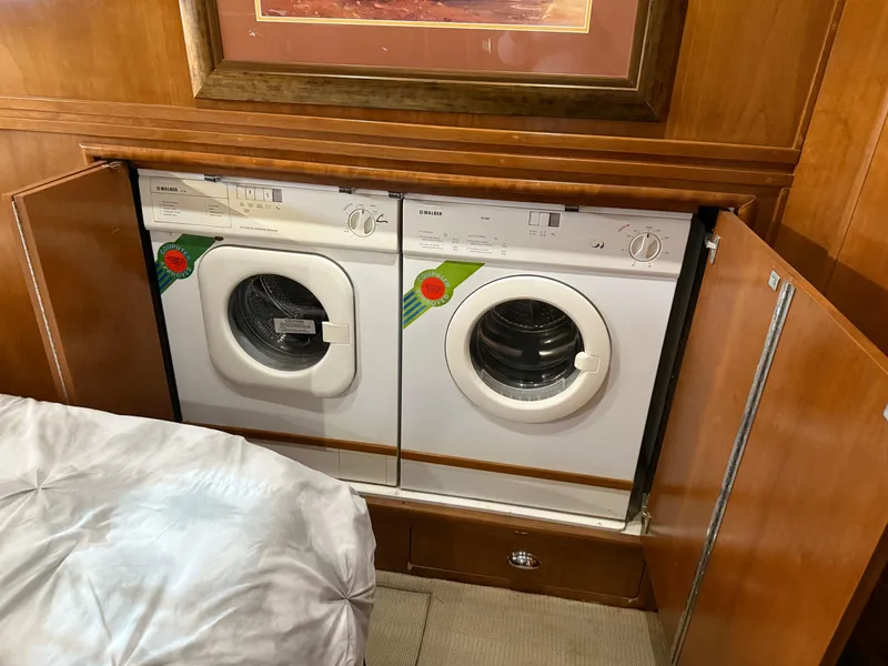 Slide: The Image of Built-in washer and dryer in 1998 Carver 530 VOYAGER yacht interior. - 42