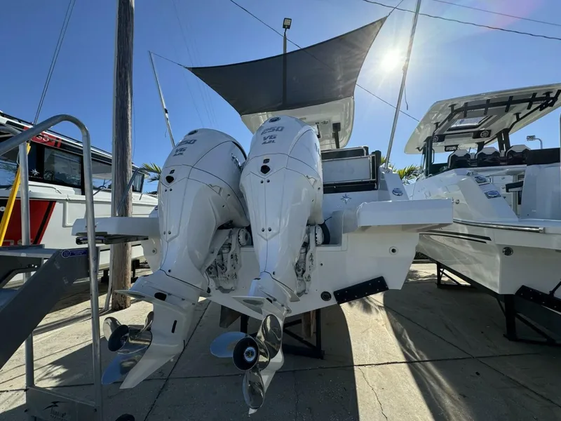 The Image of 2024 Jeanneau Leader 9.0 WA Series 2 boat docked, featuring Yamaha engines. - 1