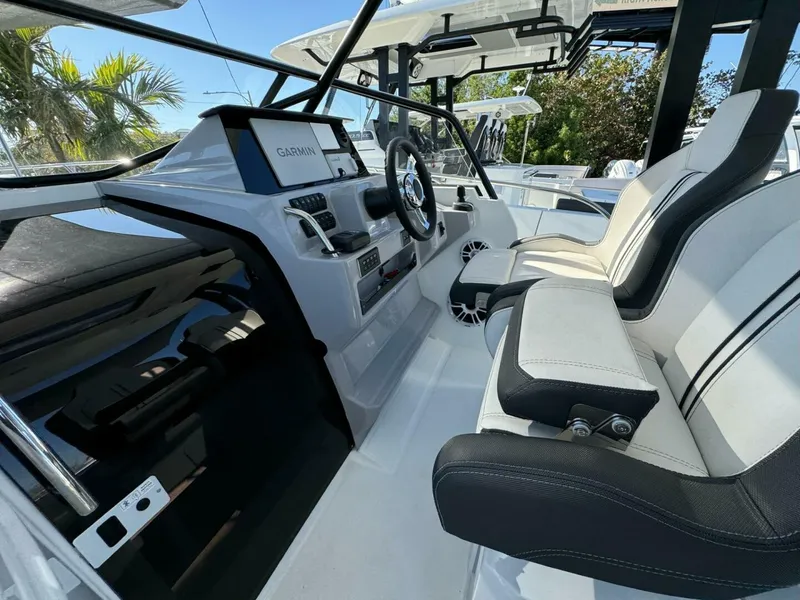 Slide: The Image of 2024 Jeanneau Leader 9.0 WA Series 2 boat interior with seating and dining area. - 5