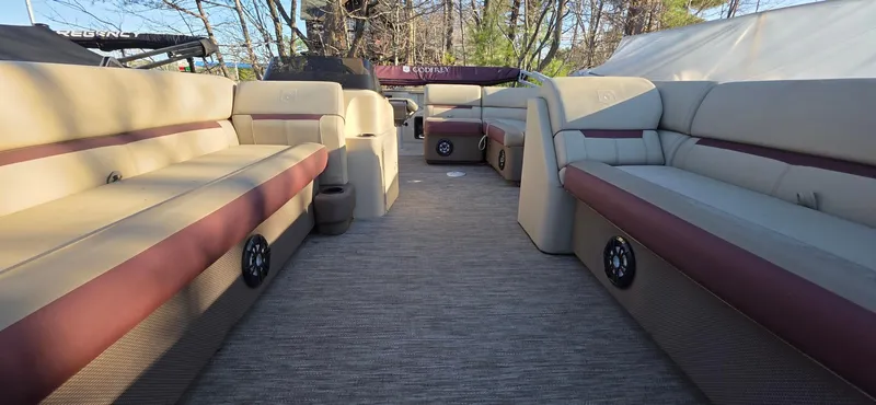 Slide: The Image of 2022 Godfrey Sweetwater 2286 FS pontoon boat interior with spacious seating and modern design. - 4