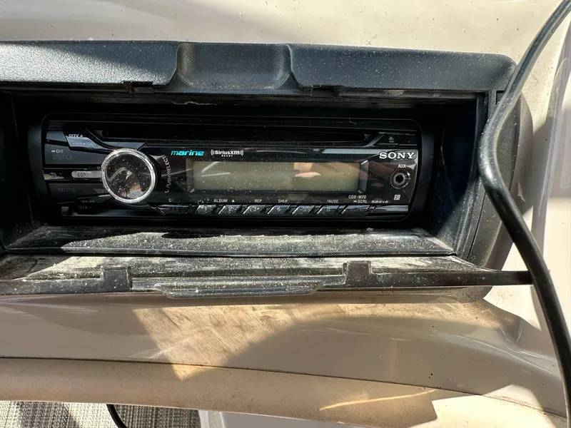 Slide: The Image of Sony marine stereo installed in a 1998 Four Winns 190 Horizon boat dashboard. - 10
