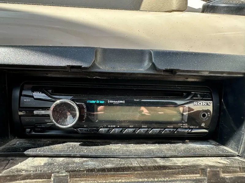 Slide: The Image of Sony marine stereo in a 1998 Four Winns 190 Horizon boat dashboard. - 22