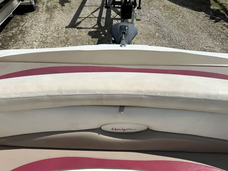Slide: The Image of 1998 Four Winns 190 Horizon boat interior with beige and maroon seating. - 37