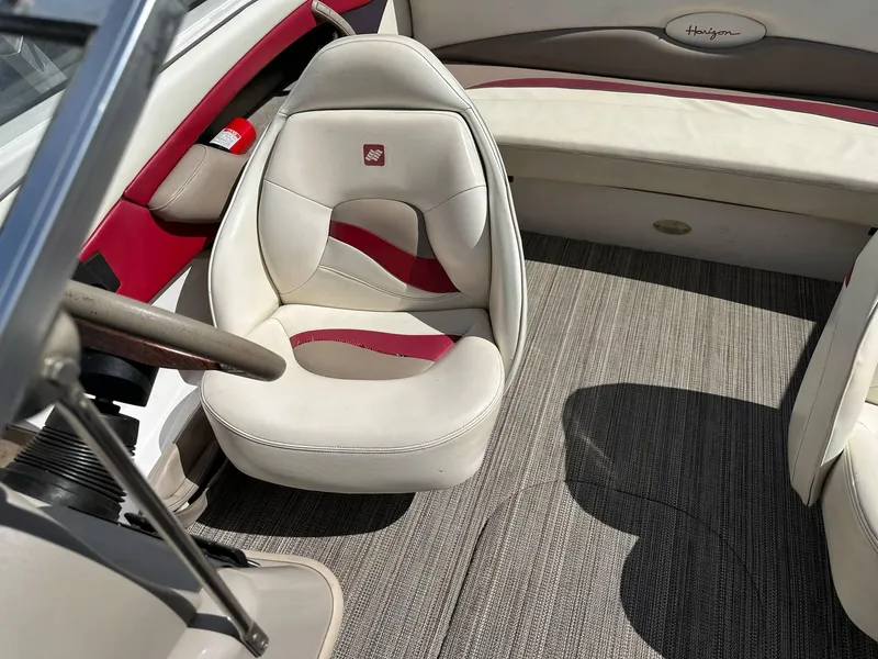 Slide: The Image of 1998 Four Winns 190 Horizon boat interior with beige and red seating. - 40