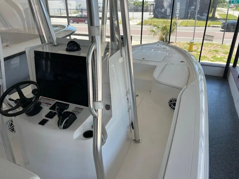 Slide: The Image of 2025 Contender 23 Bay boat interior with modern console and spacious deck. - 5