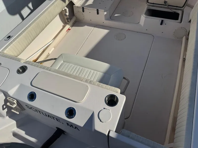 Slide: The Image of 2007 Grady-White Journey 258 boat interior, featuring seating and storage, located in Scituate, MA. - 7