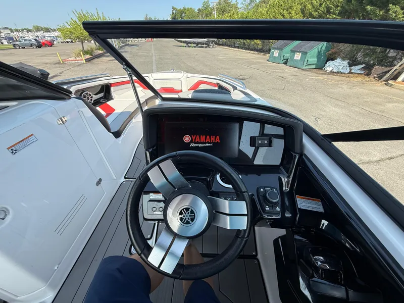 Slide: The Image of 2019 Yamaha Boats 242X E-Series dashboard and steering wheel view. - 18