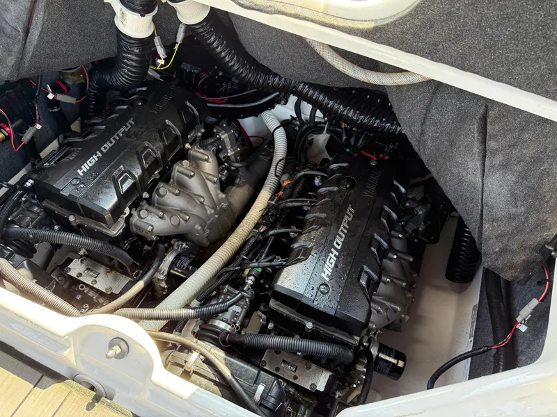 Slide: The Image of 2019 Yamaha Boats 242X E-Series engine compartment with dual high-output engines. - 26